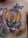 lamp tattoo on chest